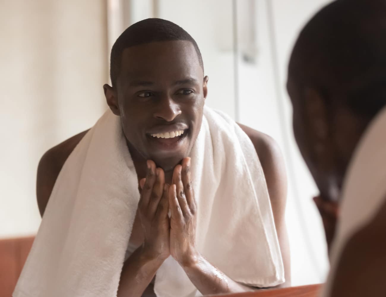 a man looking in the mirror